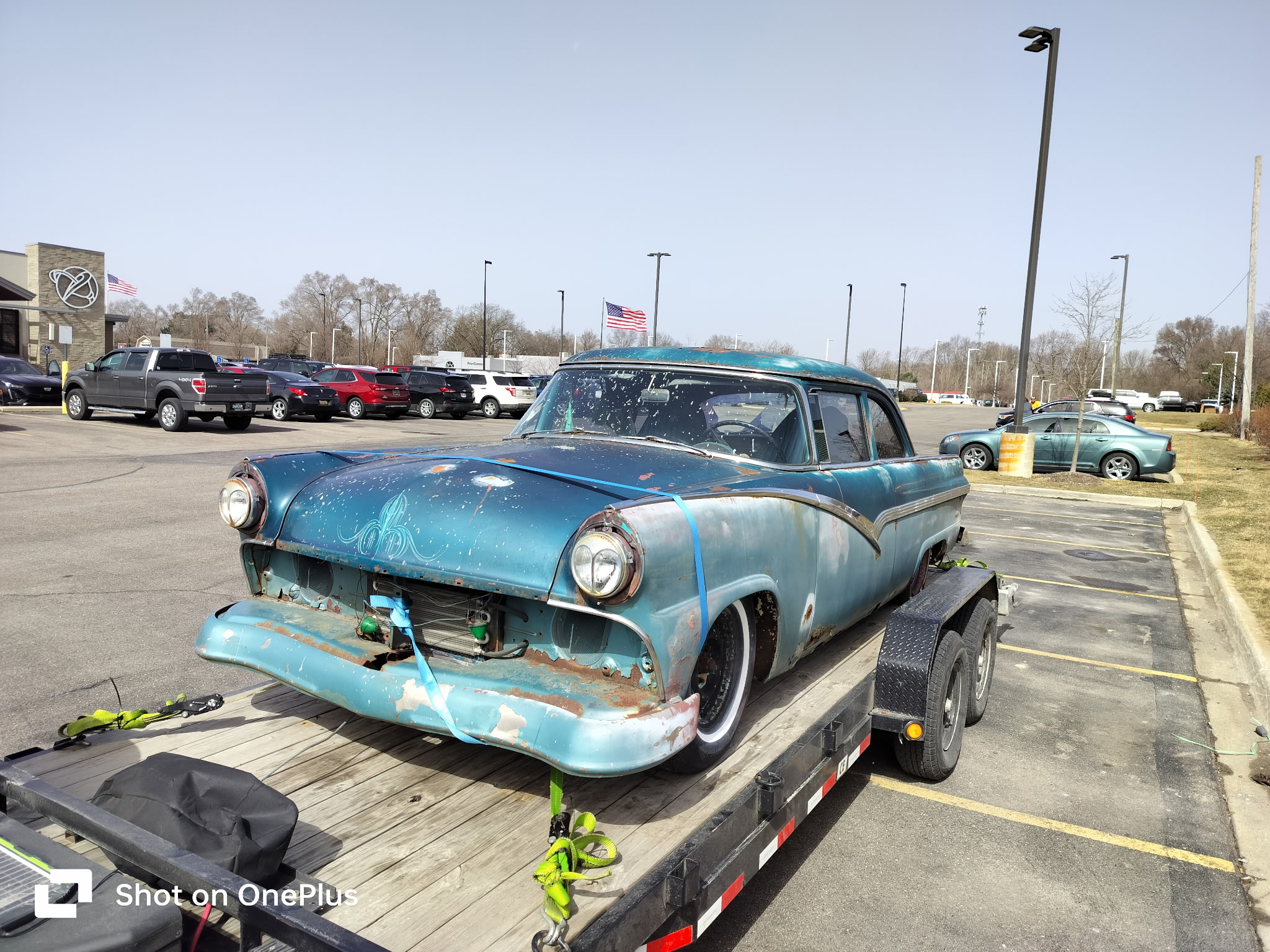Vintage classic car transported on flatbed car hauler trailer rental in Greenfield, IN